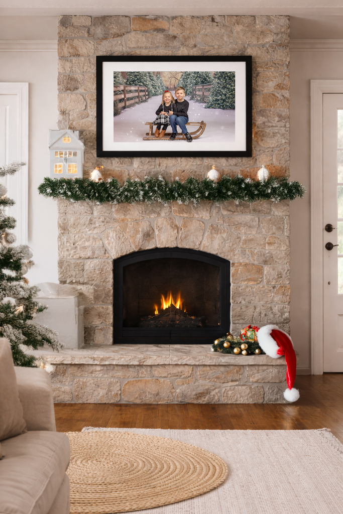 winter sibling photo framed over fireplace