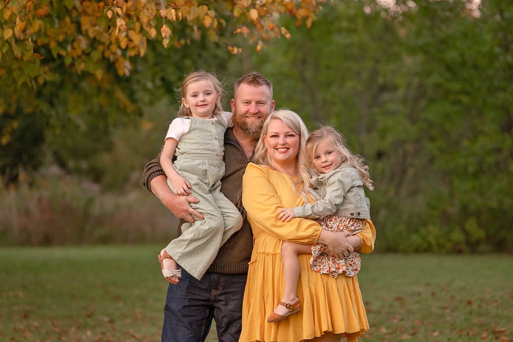 Family of four in early fall